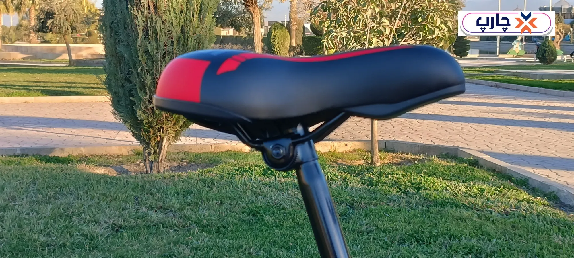 زین استفاده از دسته دنده 21 سرعته کلاج دار در دوچرخه سایز 26 دنده کلاجدار طرح المپیا رنگ مشکی قرمز